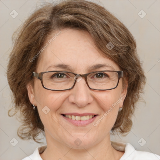 Joyful white adult female with medium  brown hair and brown eyes