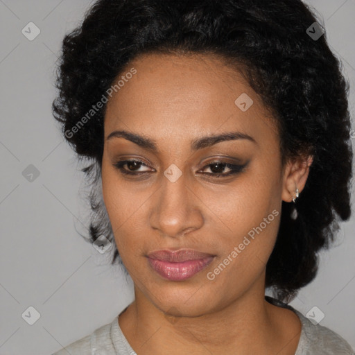 Joyful black young-adult female with medium  black hair and brown eyes