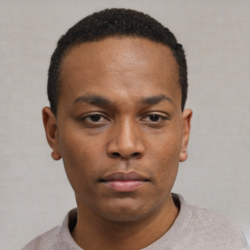 Neutral black young-adult male with short  black hair and brown eyes