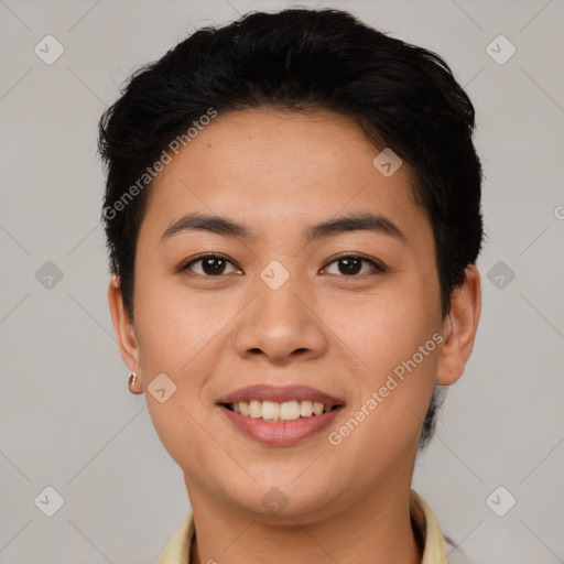 Joyful latino young-adult female with short  brown hair and brown eyes