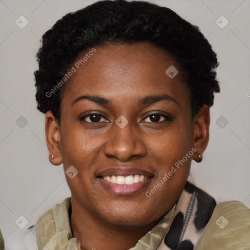 Joyful black young-adult female with short  brown hair and brown eyes