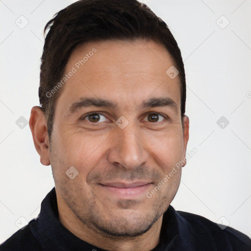 Joyful white adult male with short  brown hair and brown eyes