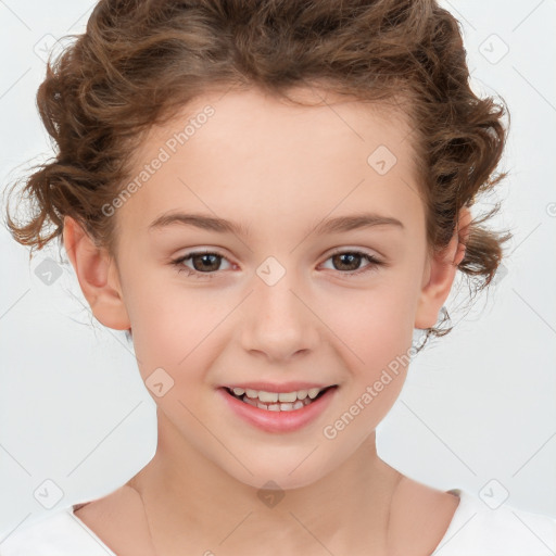 Joyful white child female with short  brown hair and brown eyes