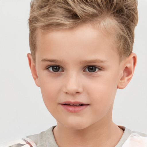 Joyful white child male with short  brown hair and brown eyes