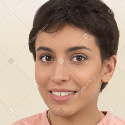 Joyful white young-adult female with short  brown hair and brown eyes