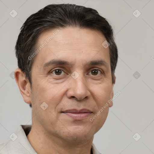 Joyful white adult male with short  brown hair and brown eyes