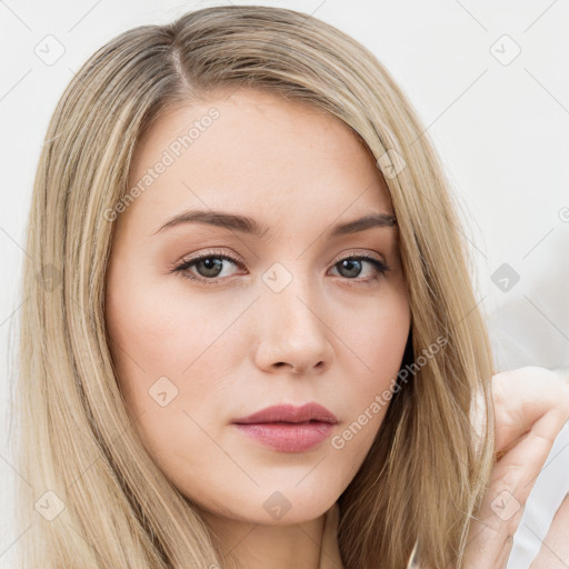 Neutral white young-adult female with long  brown hair and brown eyes