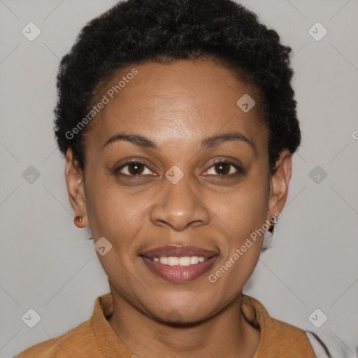 Joyful black young-adult female with short  brown hair and brown eyes