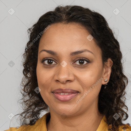 Joyful black young-adult female with medium  brown hair and brown eyes