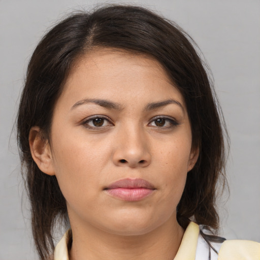 Neutral white young-adult female with medium  brown hair and brown eyes