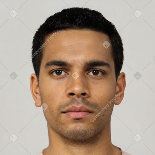 Neutral latino young-adult male with short  black hair and brown eyes