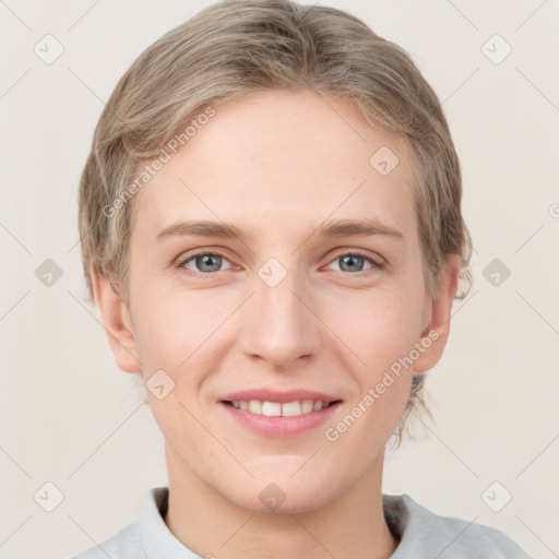 Joyful white young-adult female with short  brown hair and grey eyes