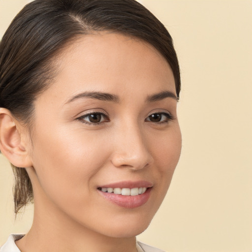 Joyful white young-adult female with medium  brown hair and brown eyes