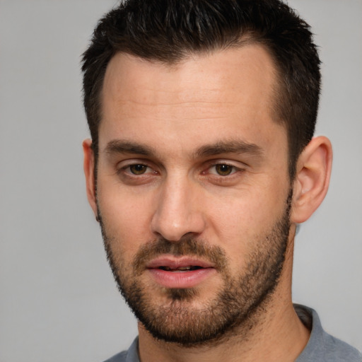 Neutral white young-adult male with short  brown hair and brown eyes