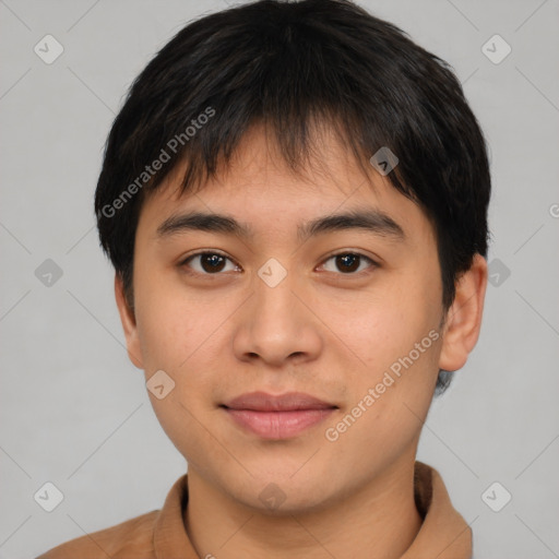 Joyful asian young-adult male with short  brown hair and brown eyes