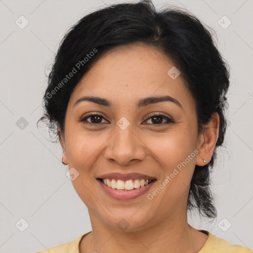 Joyful latino young-adult female with short  brown hair and brown eyes