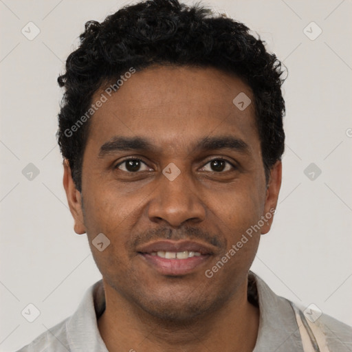 Joyful black young-adult male with short  black hair and brown eyes