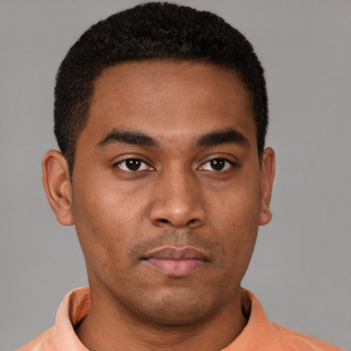 Neutral latino young-adult male with short  brown hair and brown eyes
