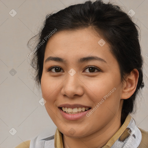 Joyful latino young-adult female with medium  brown hair and brown eyes