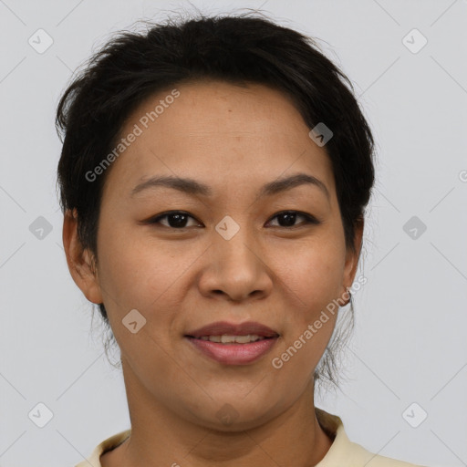 Joyful asian young-adult female with short  brown hair and brown eyes