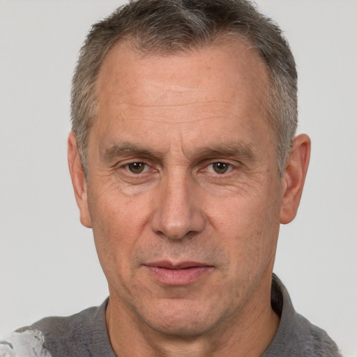 Neutral white middle-aged male with short  brown hair and brown eyes