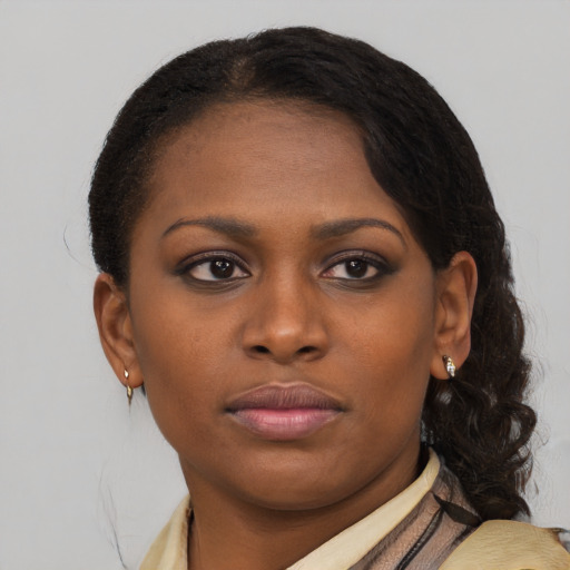 Neutral black young-adult female with medium  brown hair and brown eyes