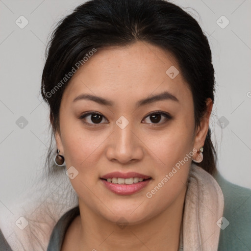 Joyful latino young-adult female with long  brown hair and brown eyes