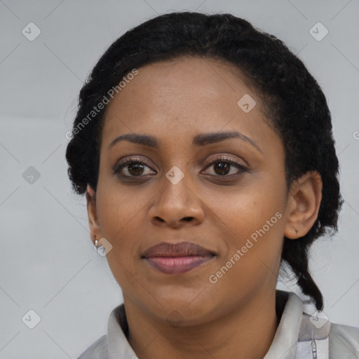 Joyful black young-adult female with medium  black hair and brown eyes