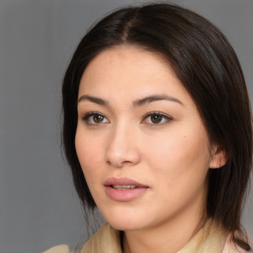Neutral white young-adult female with medium  brown hair and brown eyes