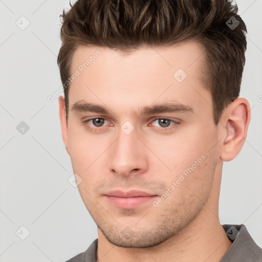 Neutral white young-adult male with short  brown hair and brown eyes