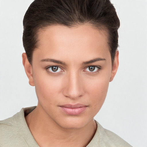 Neutral white young-adult female with short  brown hair and brown eyes