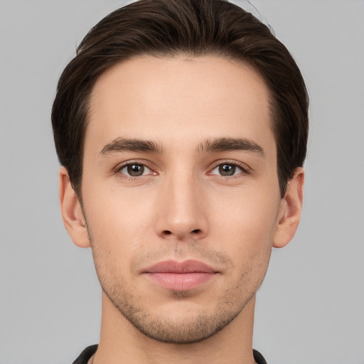 Neutral white young-adult male with short  brown hair and brown eyes