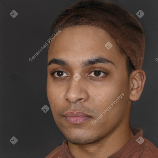 Neutral white young-adult male with short  black hair and brown eyes