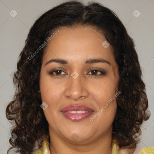 Joyful white adult female with medium  brown hair and brown eyes