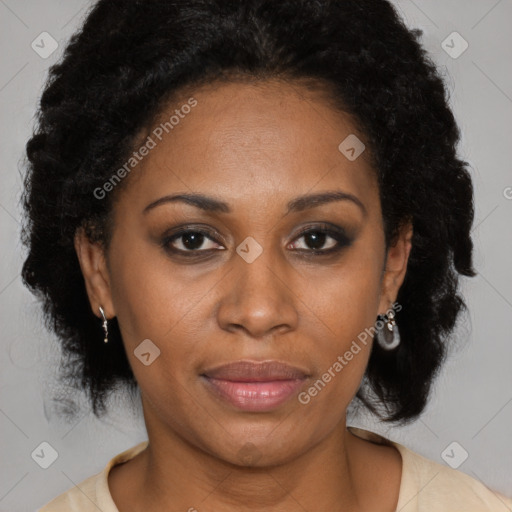 Joyful latino adult female with medium  brown hair and brown eyes