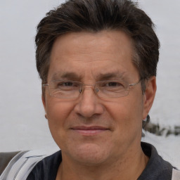 Joyful white middle-aged male with short  brown hair and brown eyes