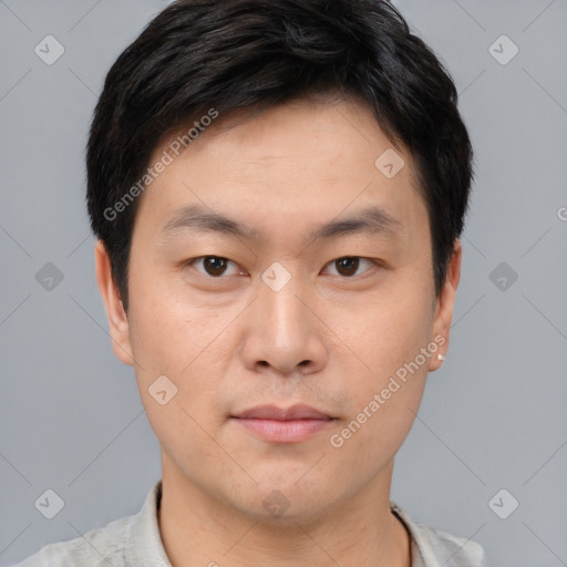 Neutral asian young-adult male with short  brown hair and brown eyes