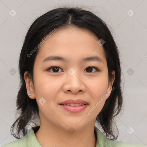 Joyful asian young-adult female with medium  brown hair and brown eyes