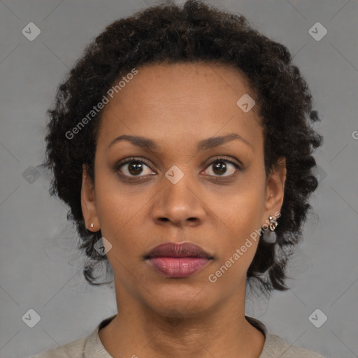 Neutral black young-adult female with short  brown hair and brown eyes