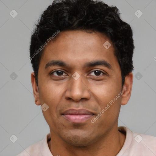 Joyful latino young-adult male with short  black hair and brown eyes