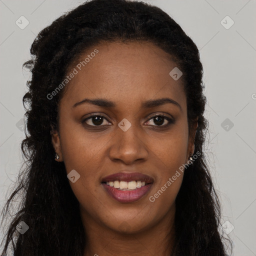 Joyful black young-adult female with long  brown hair and brown eyes