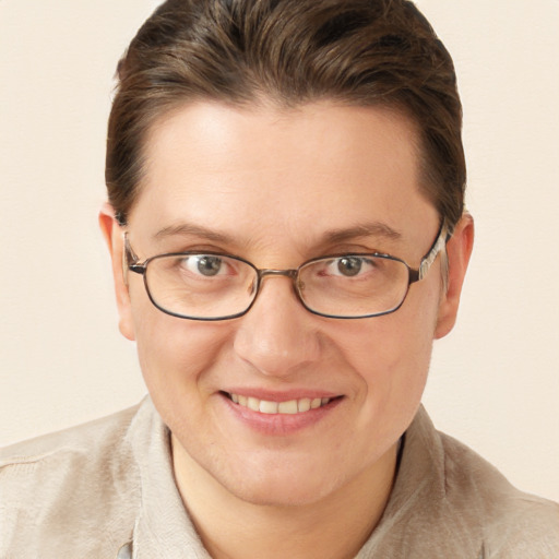 Joyful white adult female with short  brown hair and brown eyes