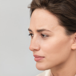 Neutral white young-adult female with short  brown hair and brown eyes