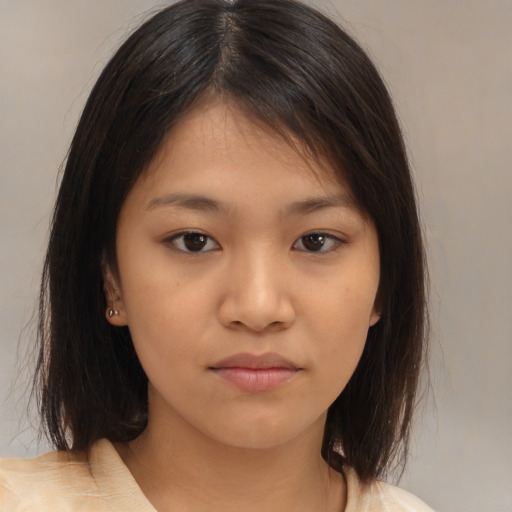 Neutral asian young-adult female with medium  brown hair and brown eyes