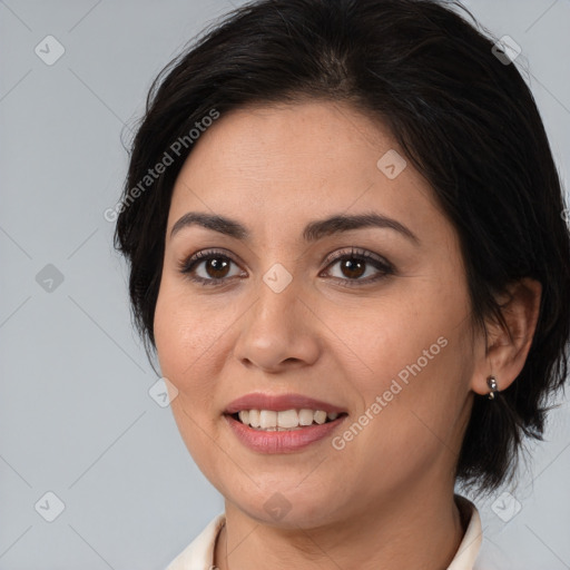 Joyful white young-adult female with medium  brown hair and brown eyes