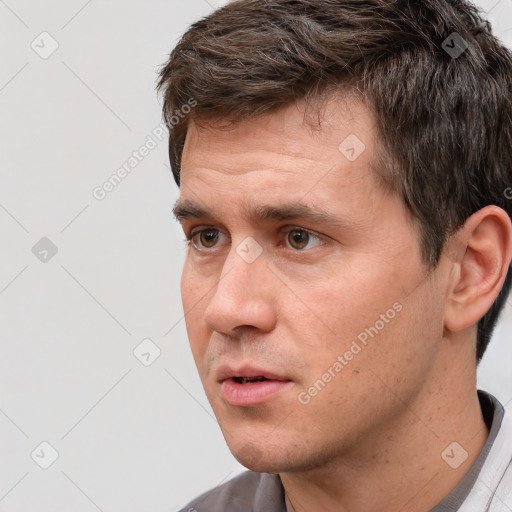 Neutral white adult male with short  brown hair and brown eyes