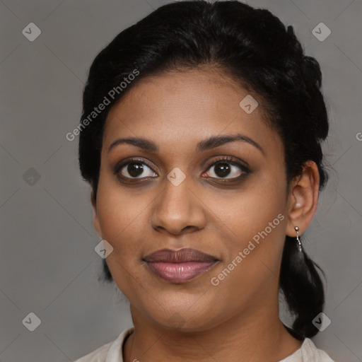 Joyful black young-adult female with medium  black hair and brown eyes