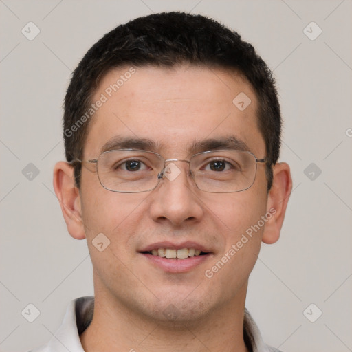 Joyful white adult male with short  brown hair and brown eyes