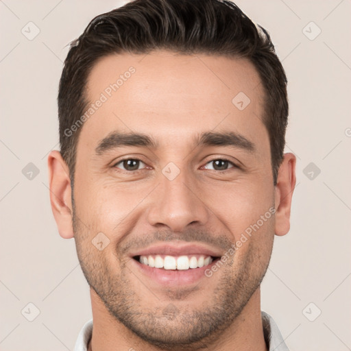 Joyful white young-adult male with short  brown hair and brown eyes