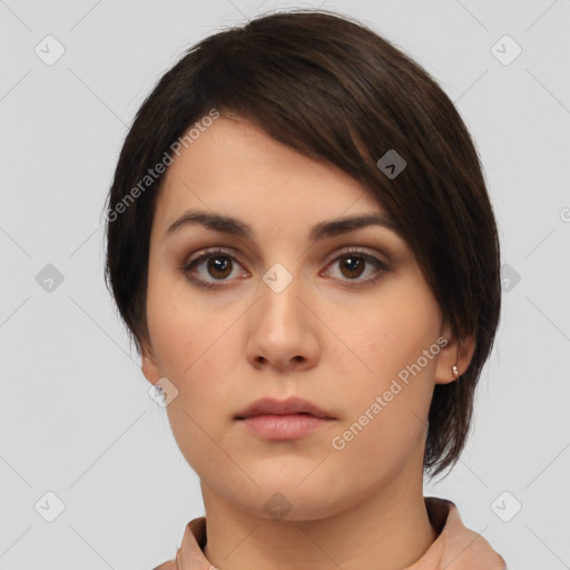 Neutral white young-adult female with medium  brown hair and brown eyes